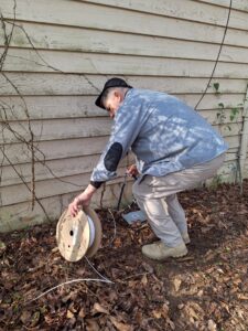 A tech installing fiber to a home in Riverdale